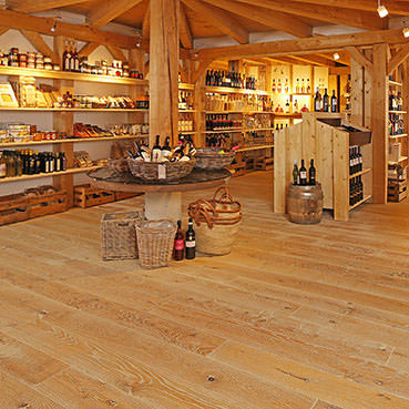 Old charm in brilliant new look - Traditional wine shop Wein & Co. is the ultimate experience Rothbucher's Da Vinci on HARO Parquet