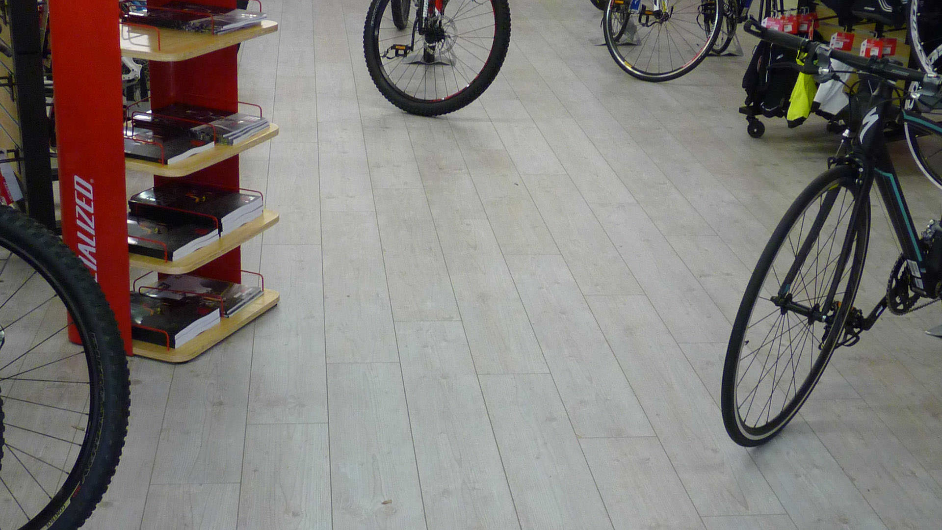 Bicycle Specialist Chooses Floor Covering Specialist